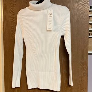 White turtleneck ribbed sweater